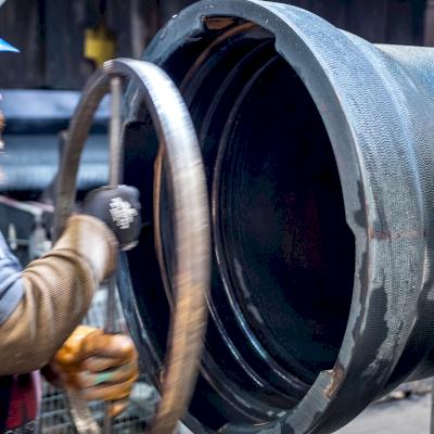 McWane Ductile inspects the DI pipe during manufacturing.