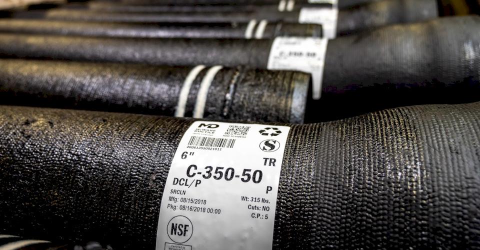 Example of a Mill Certification Sticker applied to ductile iron pipe.