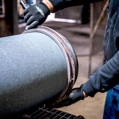 Quality check on the spigot end of DI pipe.