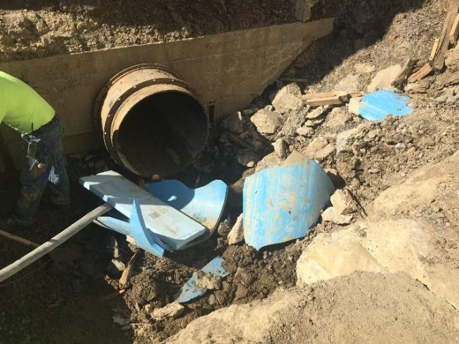 PVC pipe that has burst.