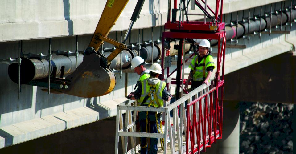 A bridge-crossing installation using Ductile iron pipe.