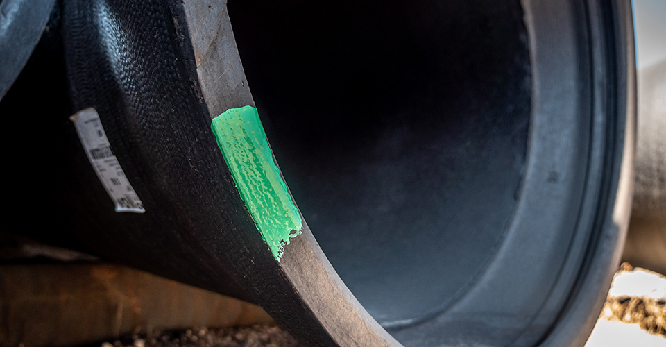 Gauged Full Length pipe has green tick marks painted o the face of the bell.