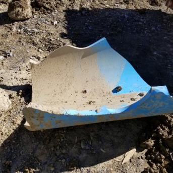 PVC pipe that has burst under pressure.