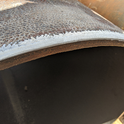 A beveled pipe close-up.