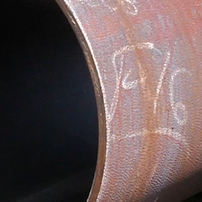 A field-cut pipe close-up.