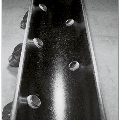 Cutaway of the inside of tapped pipe showing corporation stops do not damage the cement mortar lining.