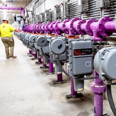 Exposed DI pipe often receives additional paint such as purple to indicate reclaimed/re-use water.