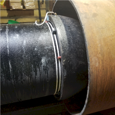 Side-view of finished TR Flex joint assembly with cold-weather electrical thawing cable also included.