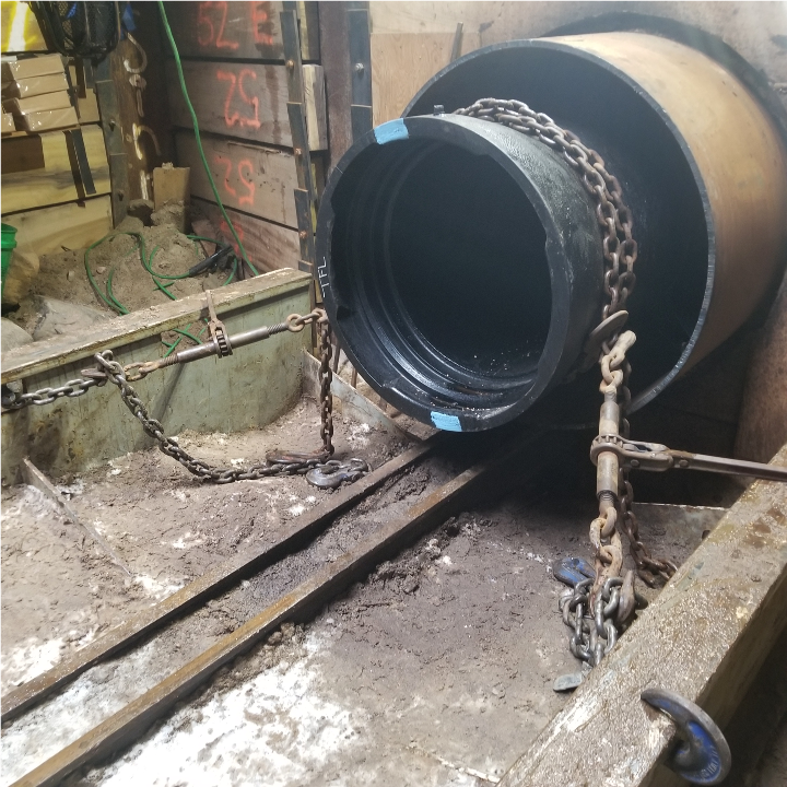 24-inch TR Flex pipe held steady and ready in the casing during joint assembly.