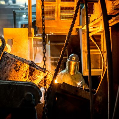 An iron pourer at McWane Ductile's Utah foundry.